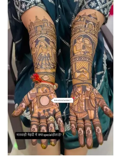 A Marwari-style bridal mehandi, this design is packed with figures and scenes, including a camera to symbolize capturing memories.