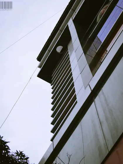 An abstract angle of a modern building's exterior. I enjoy finding patterns and lines in architecture to create minimalist and graphic images.