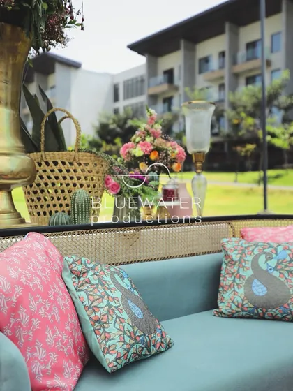 Custom cushions with Gond art motifs add a personalized and artistic touch to the lounge seating.