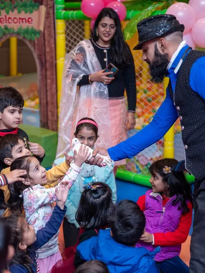 The magic show at Nirali's Barbie party was a huge hit. The children were amazed and delighted, especially when they got to interact with the magician's dove.