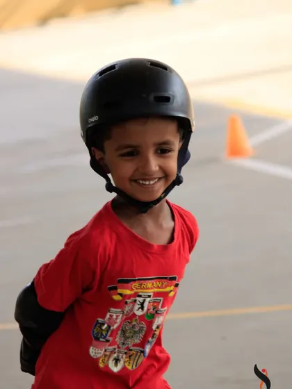 The happy face of a child who is enjoying his skating lesson. Seeing these smiles is my biggest reward as a coach and confirms we are creating a positive experience.