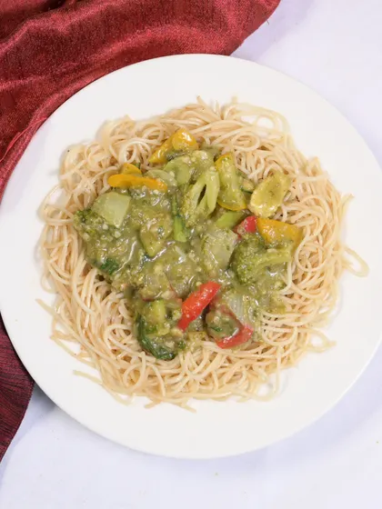 Looking for a wholesome and satisfying meal? Look no further than my special Stroganoff, served over a bed of noodles.