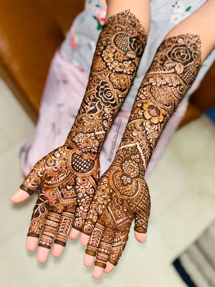 A full view of a stunning engagement design, featuring a mix of florals, paisleys, and a heart motif.