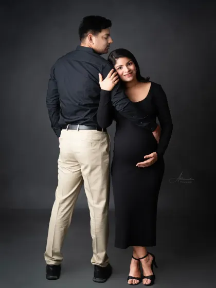 A unique and stylish pose. This back-to-front couple's portrait is modern, creative, and shows a different kind of connection.