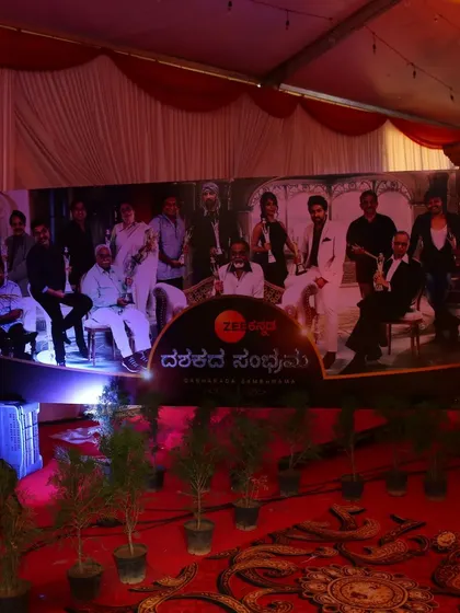 A closer look at the branded backdrop for the Zee Kannada 'Dashakada Sambhrama' celebration, designed to be a central point for photos and media coverage.