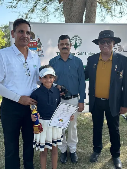 Suhani receives her winner's trophy at the IGU Tournament held at Mayo College, Ajmer.