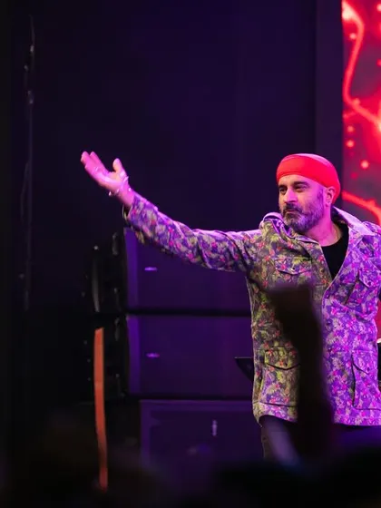 A candid shot of me on stage, interacting with the audience during the Ganesh Utsava.