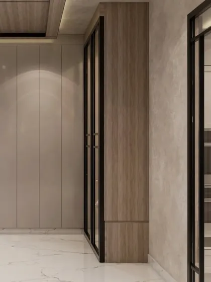 A detail shot of the entryway corridor, showing the seamless integration of storage closets with glass and wood paneling. The design focuses on clean lines and a blend of materials.