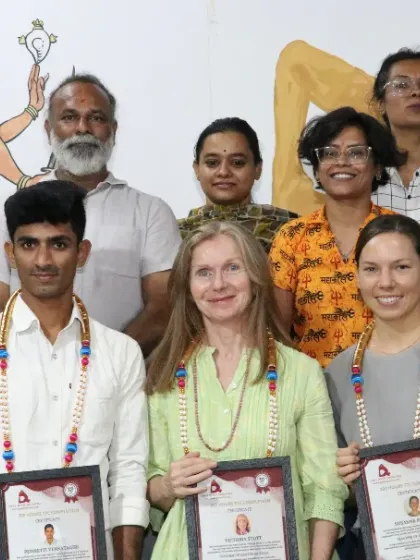 A group of students who have completed their 200 and 500-hour TTCs, ready to take their practice to the next level.