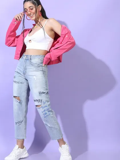 A trendy, casual look featuring a white crop top, ripped jeans, and a bright pink denim jacket. This is a classic e-commerce shot that clearly shows how to style multiple pieces together.