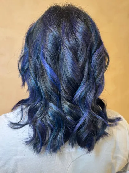 This is my Midnight Blue Rose vibe. I created a multi-tonal look with deep sapphire and violet hues melting together for a galaxy-inspired effect. This is a bleach color, perfect for anyone wanting to make a statement.