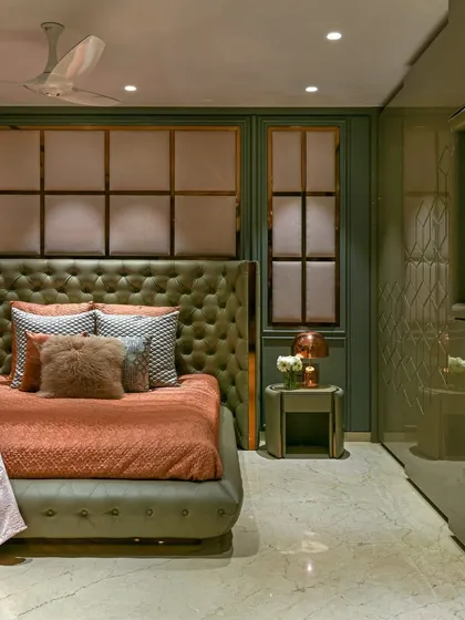 This angle highlights the glossy finish of the wardrobe and the intricate details of the wall paneling, showcasing our commitment to high-quality craftsmanship.