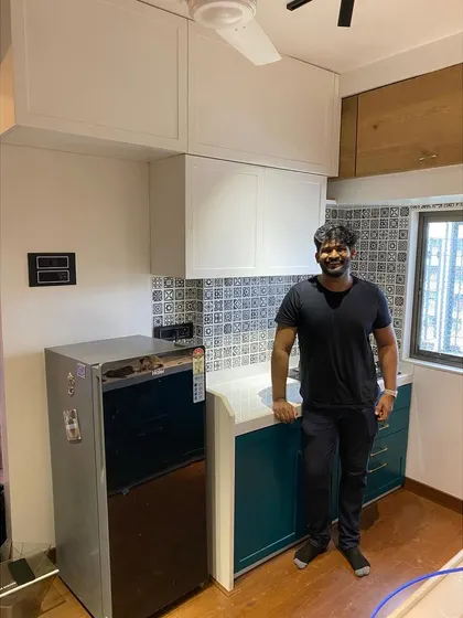 A proud moment with client Abhi in his newly completed kitchen. The project highlights my ability to deliver high-quality, bespoke kitchens that reflect the client's personality.