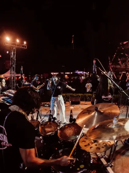 Another perspective from our outdoor show, with the drummer's view of the stage. It highlights the teamwork and energy that goes into every Moksha All Stars performance.