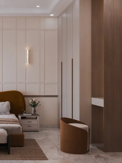 This angle shows the other side of the room, with a simple vanity and chair, maintaining a cohesive and elegant design.