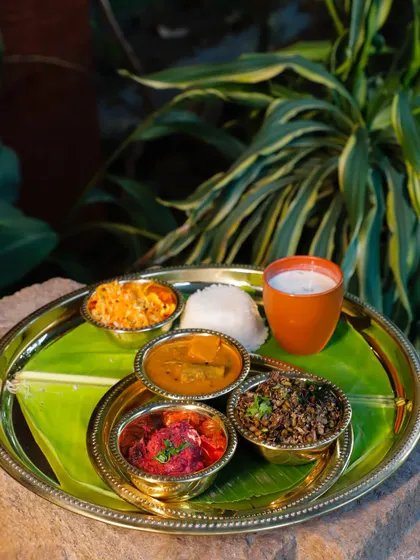 This is Vazhakoombu, or Banana Blossom Thoran, an unconventional delight. Made from the tender banana heart and cooked with green moong lentils, it has a unique texture and flavor that elevates any meal.