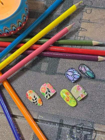This matching set features delicate floral patterns and a beautiful butterfly wing design. Learning to create coordinated sets adds great value to your service offerings.