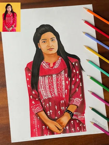 This A3 colored pencil portrait features a beautiful red traditional dress. I use layers of color to get the rich tones and patterns just right.