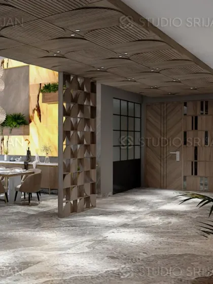 This shot of the Varanasi project highlights the textured stone flooring and the open, airy feel of the lobby and dining space.