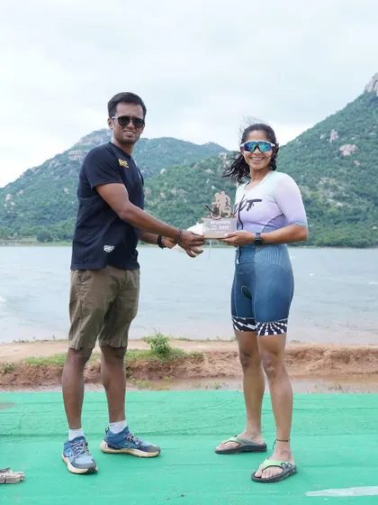 Receiving the winner's trophy at the BMF 47.5. This was a mature, controlled race in harsh, windy conditions. Winning is great, but executing the race plan perfectly is the real victory.