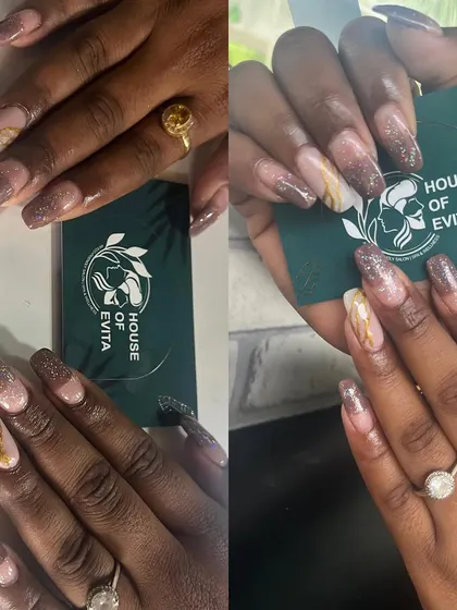 A beautiful example of marble and glitter nail art. This design combines a soft glitter gradient with a realistic marble effect on accent nails for a textured, luxurious finish.