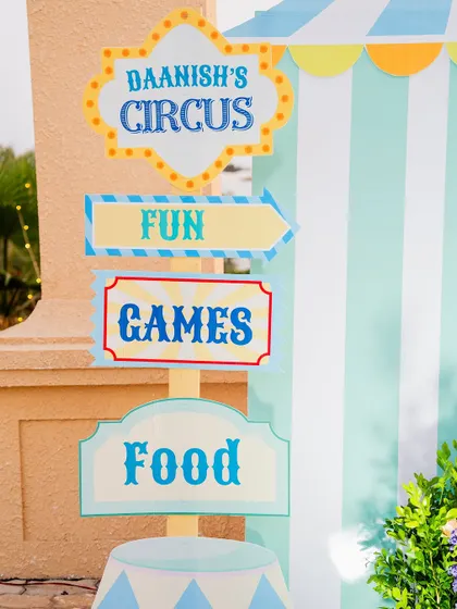 Fun, games, and food this way! Themed directional signs are a great way to guide guests and add an authentic touch to the carnival atmosphere.