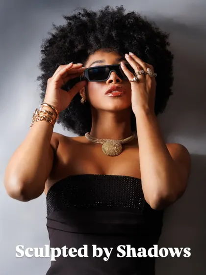 We use shadows to sculpt our subjects. This portrait uses dramatic, directional light to highlight the model's features and the bold texture of the jewellery, creating a powerful, high-contrast image that feels like a piece of art.