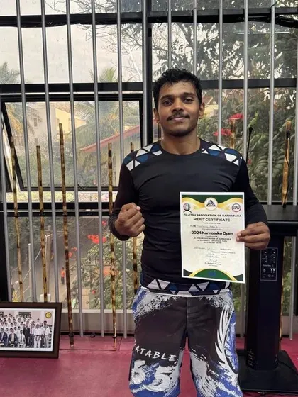 A duplicate of image 89, holding my certificate.