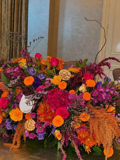 This vibrant Diwali table runner is a riot of color. I mixed bright oranges, pinks, and purples to create a joyful and festive centerpiece for a holiday meal.