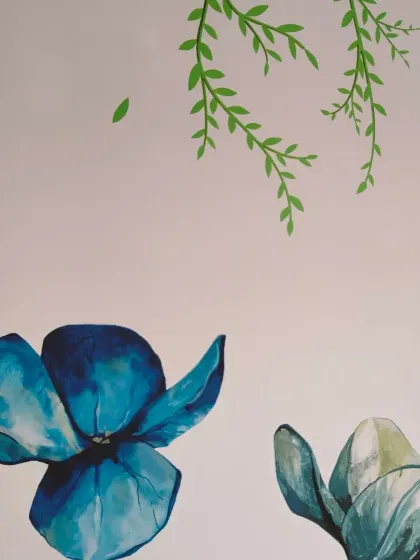 A close-up of the watercolor-style blue flowers, showcasing the delicate brushwork.