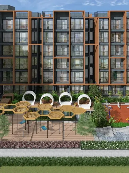This courtyard playground at Casagrand Southbrooke is designed with unique, honeycomb-shaped shade structures and egg-like seating pods, creating a whimsical and imaginative environment.