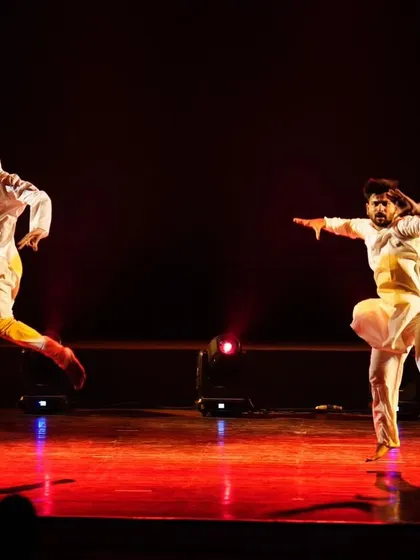 A dynamic leap captured during our patriotic contemporary performance, 'Inquilab.' The dancers' movements expressed the power and spirit of revolution.