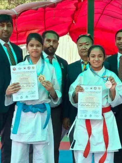 Two of our female athletes with their medals after the Gautam Buddh Nagar district championship.