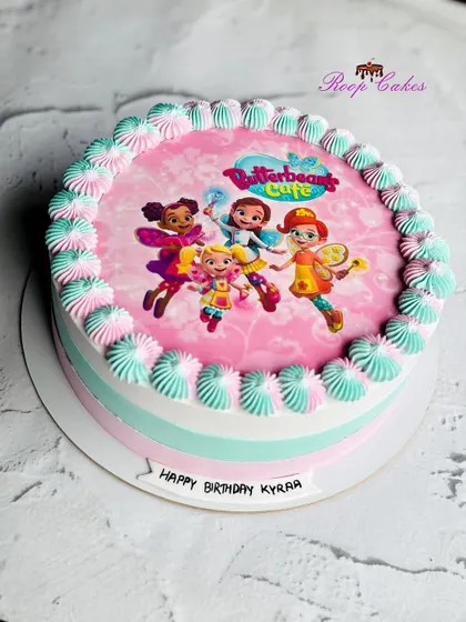 A simple and sweet half-kg cake with a Butterbean's Café theme, perfect for a smaller celebration.