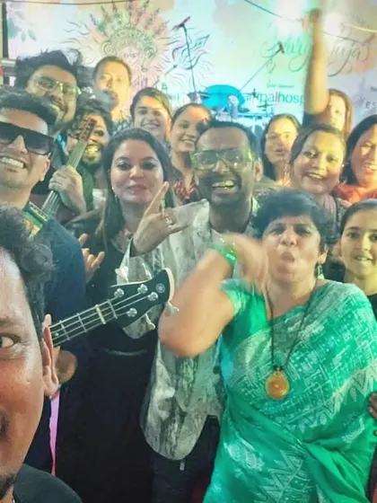 A fun selfie with the audience during a rocking Durga Pooja celebration at Purva Fountain Square. Festival gigs are all about community and shared joy.