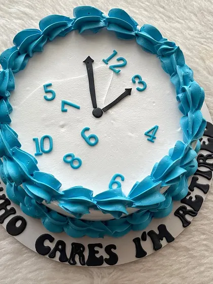 A retirement cake with a sense of humor. The clock face design says it all: "Who cares, I'm retired!"