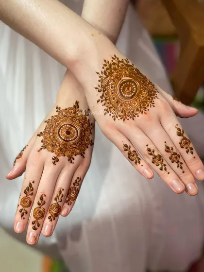 A delicate and minimal mandala design. This is perfect for someone who wants a touch of henna without full coverage.