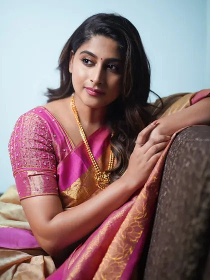 A slightly different angle, capturing a thoughtful expression. It's important to get a variety of moods in a single session.
