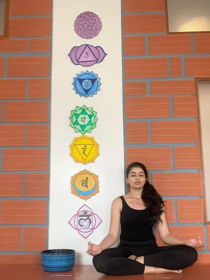 A memory from our second shala. The warm brick tones and chakra art created a unique energy for practice, and we carry those fond memories into our new space.