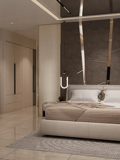 In this large-scale 7500 sq. ft. project, we executed a master bedroom suite that balances luxury with comfort. Our work included installing the marble-finish headboard wall with metal inlays, the custom wardrobe units, and ensuring all electricals for the pendant and accent lighting were perfectly placed.