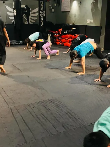 We use dynamic animal flow movements like the bear crawl to build total-body strength, coordination, and agility. This type of functional fitness is key for real-world combat mobility.