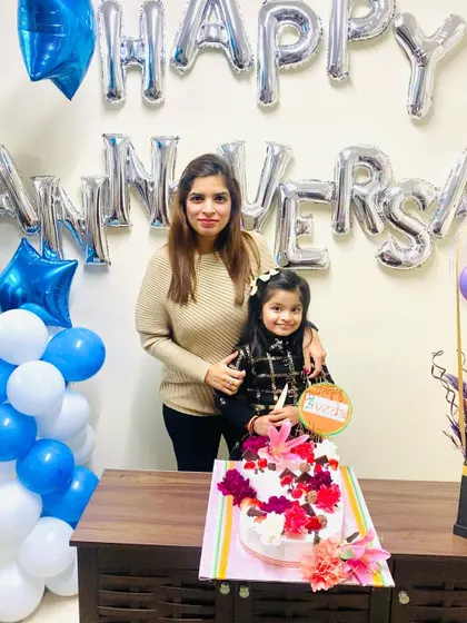 A special moment with my daughter during our clinic's 9th anniversary celebration. Family is my biggest support system.