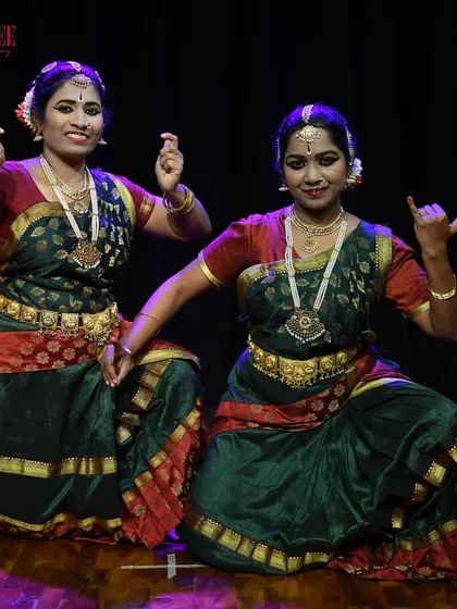 Two of our adult students in a moment of performance. Learning Bharatanatyam as an adult is a powerful journey of self-discovery and strength. We are so proud of their dedication.