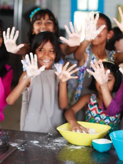 Floury hands and happy faces are the signs of a successful kids' cooking class. We believe in learning through doing, and having a lot of fun along the way.