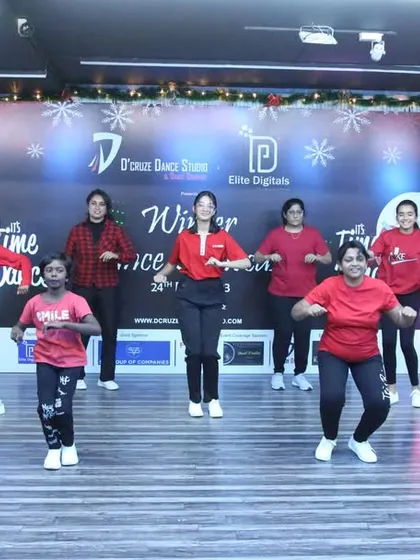 The girls' batch performing a fun, energetic routine for the holiday showcase.