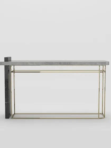 A studio view of our marble and metal console table, showcasing its minimalist form and the beautiful contrast of materials.