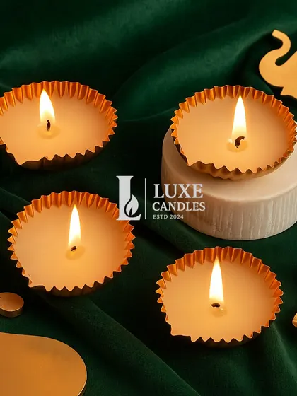 The 'Kesar Jyot' candle, a simple yet elegant fluted metal candle that provides a warm, inviting glow for your Diwali gatherings.