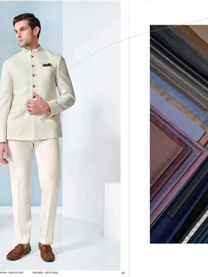 A stunning, regal, and charming attire. This all-white Jodhpuri suit, paired with our wide selection of fine fabrics, is a testament to classic elegance.