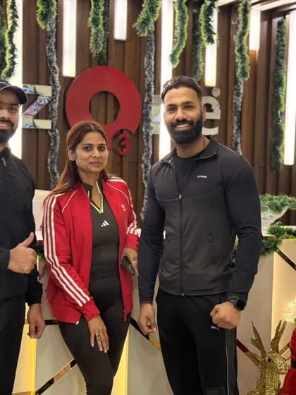 Our trainers and members share a moment, highlighting the strong bonds within our fitness family.