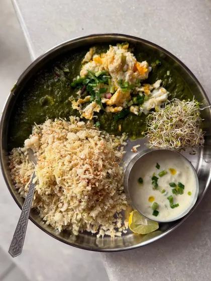 My take on Palak Paneer, where I swapped paneer for egg, served with cauliflower-cabbage rice and a cold bottle gourd soup. This shows how easily meals can be adapted to individual needs and preferences.